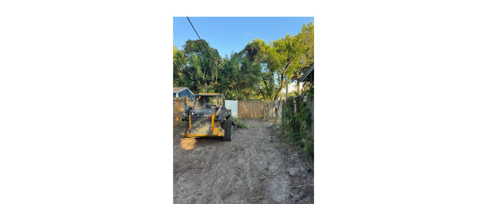 John Deere 325G compact track loader clearing a wooded lot for Decker Operations